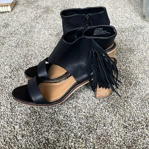 Black fringe heels